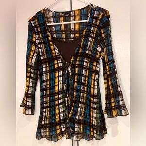 Layered look long sleeve blouse.